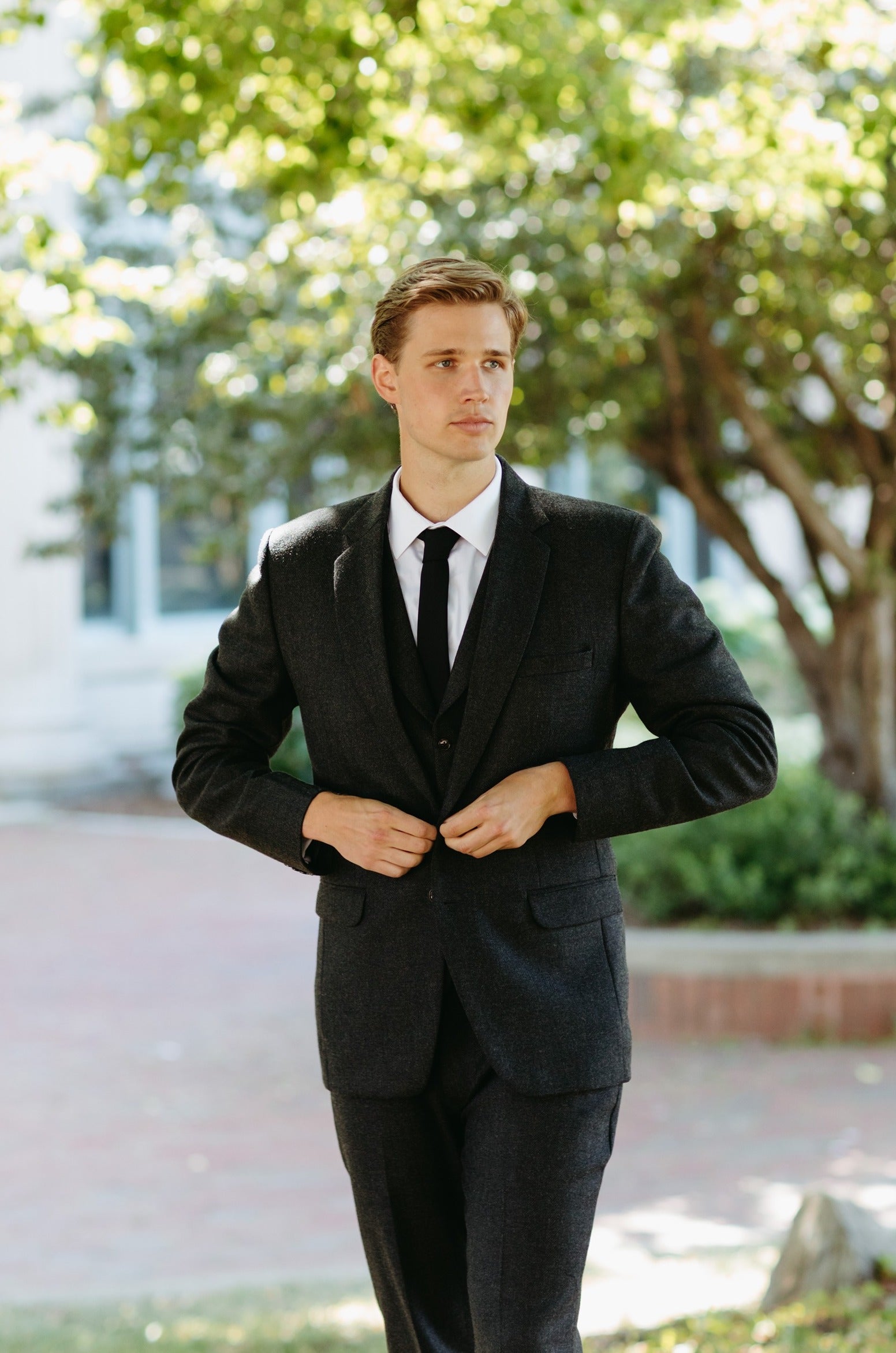Groom in custom Pana Mina suit - hero slide 1
