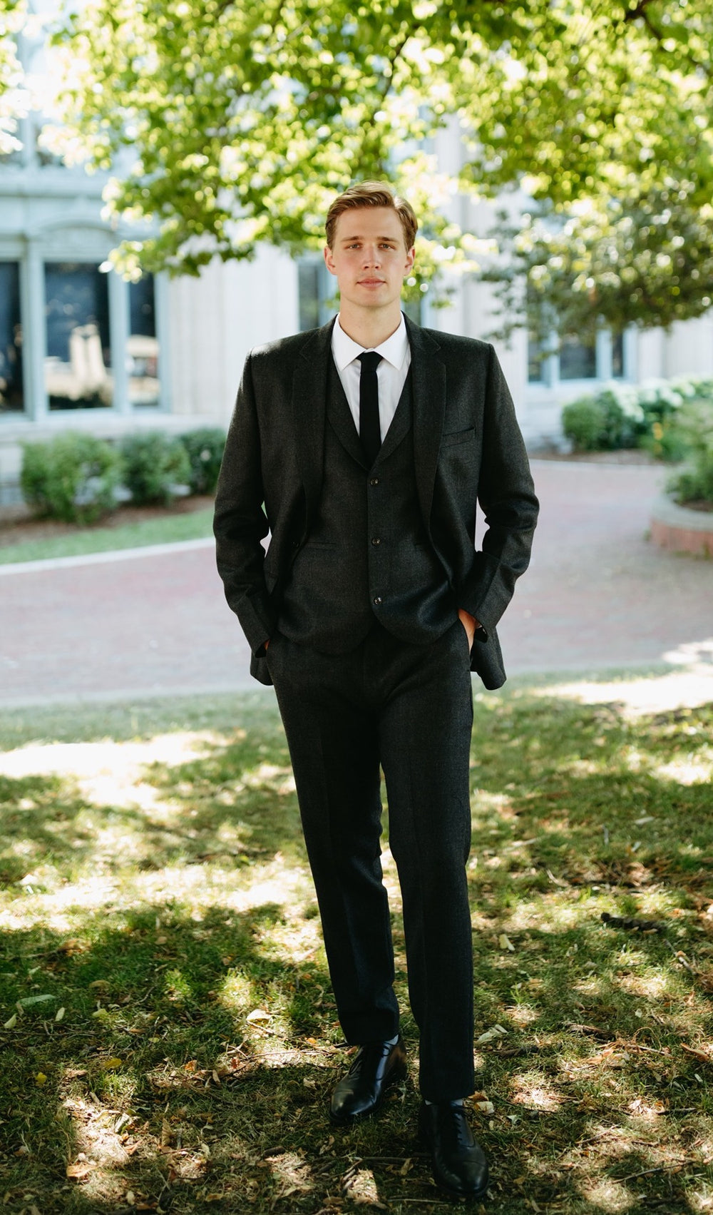 Groom portrait in custom suit